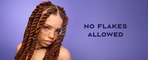 Image of a black woman with braids &amp; freckles next to text: "no flakes allowed".
