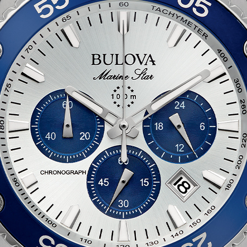 Close-up image of the blue subdials against the silver-tone dial