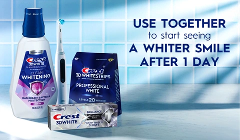 Crest 3DWhite oral care products on a bathroom counter. Use together for a whiter smile after 1 day.