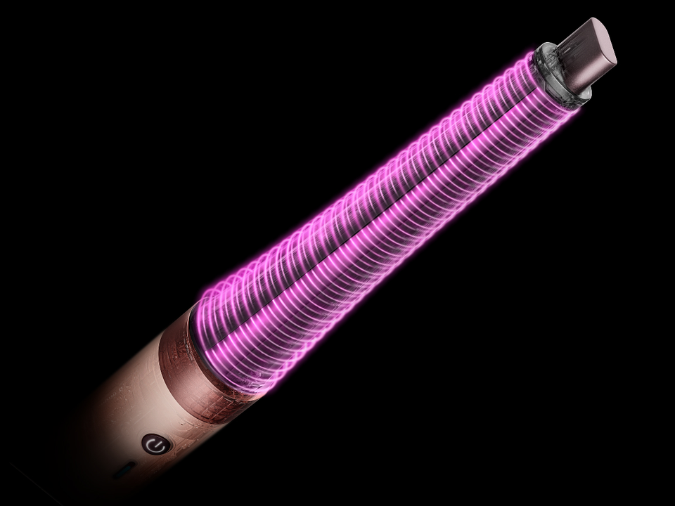 Pink graphics show the airflow around the Conical curling barrel.