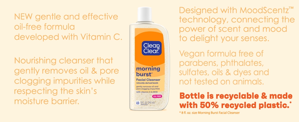 Bottle of Clean &amp; Clear Morning Burst Facial Cleanser on orange background