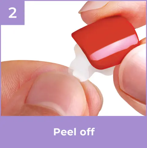 2. Peel backing from the nail, exposing the adhesive.