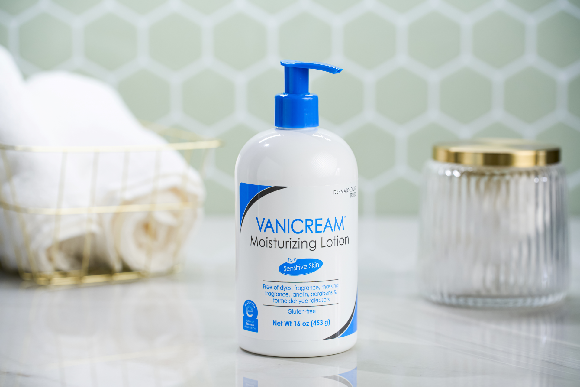 a bottle of Vanicream Moisturizing Lotion sits on a bathroom counter.