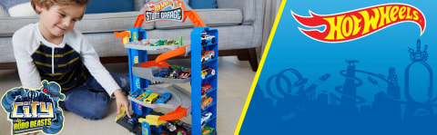 Gar&aacute;ž Hot Wheels s v&yacute;tahem, kaskad&eacute;rsk&yacute;mi kousky a parkov&aacute;n&iacute;m pro 20+ vozidel!