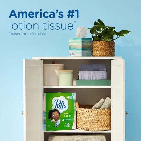 Open white cabinet showing Puffs with Lotion Box