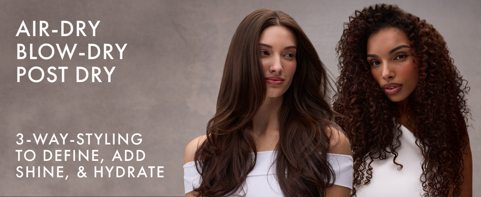 Two women, one with straight, long, brunette hair and the other with curly, long, dark hair.