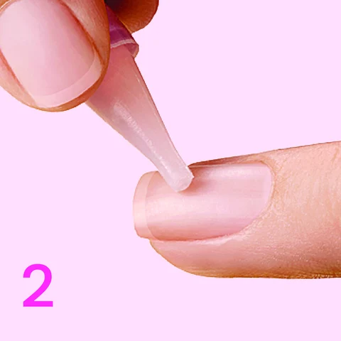 2. Apply glue to natural nail.