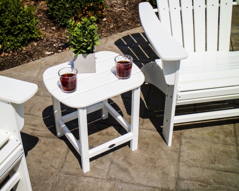 Overhead view of chairs and side table in white