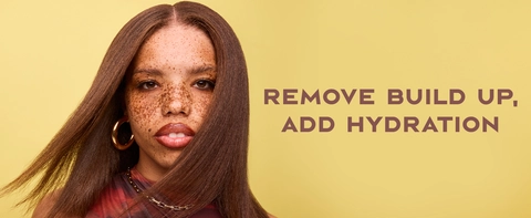 Image of a black woman with freckles &amp; straight hair next to text: &quot;remove build up, add hydration&quot;.