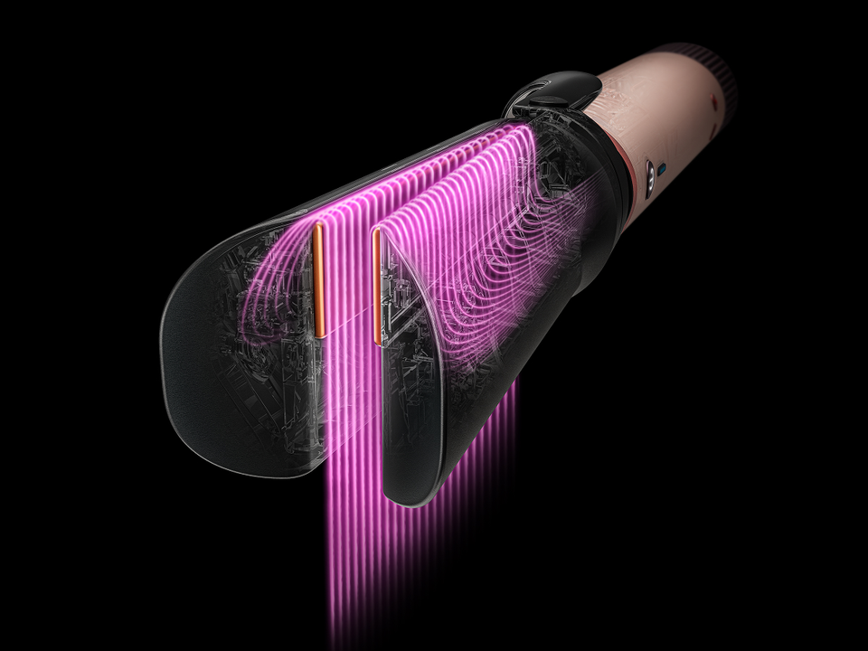 Pink graphics show the airflow through the Air straightener 2x attachment.