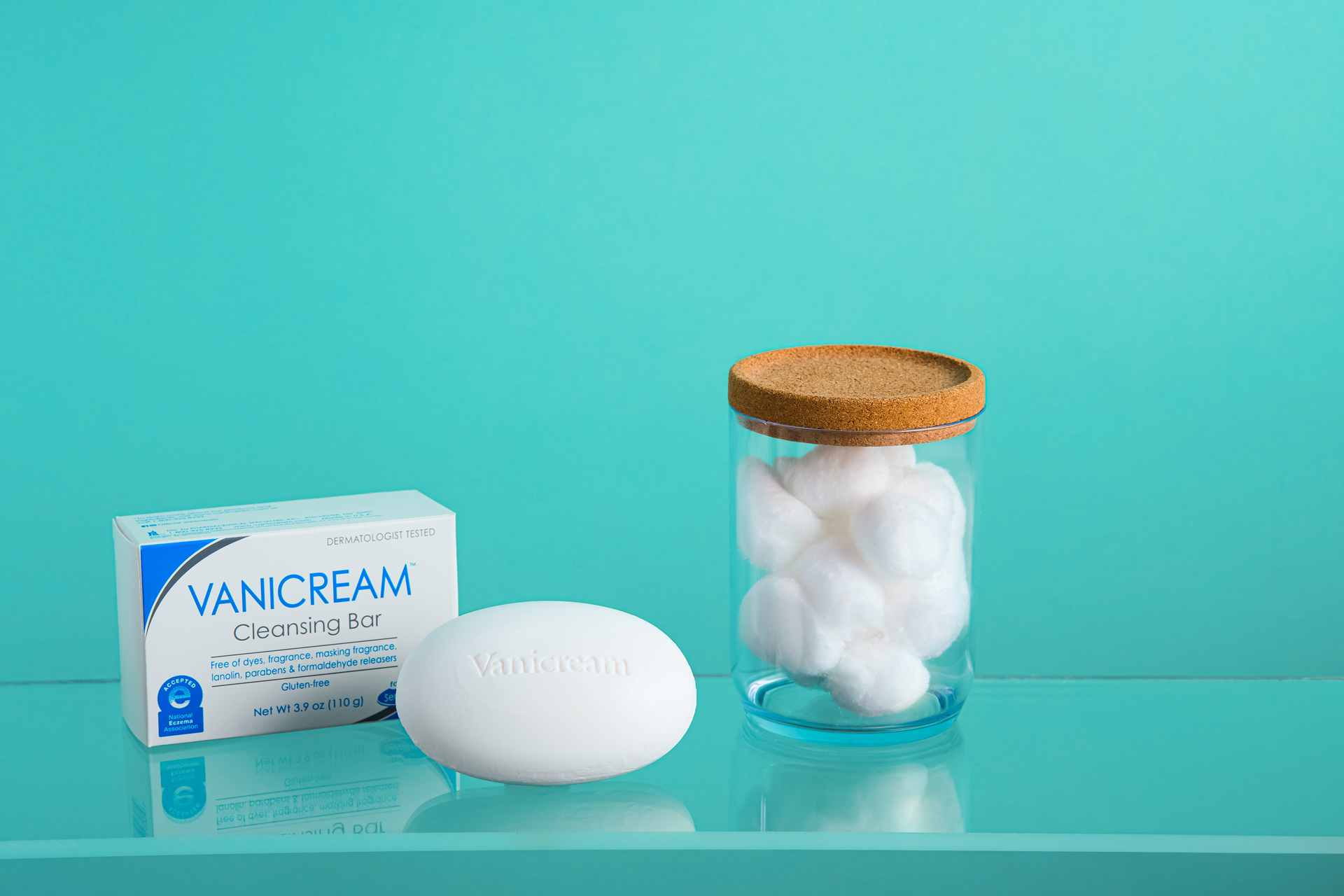 a Vanicream™ Cleansing Bar rests next to a box on a shelf.