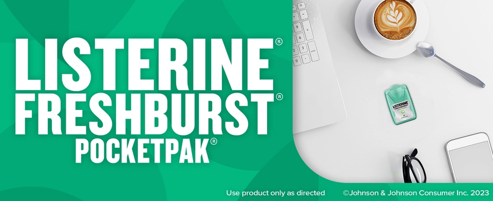 Listerine Freshburst PocketPak sitting on a desk near a cup of coffee to tackle bad breath germs