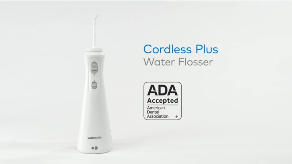 thumbnail video image 2 of Waterpik Cordless Plus Water Flosser with 2 Settings, 4 Tips, ADA Accepted, White, 2 of 15