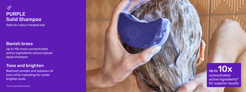 Image of Ethique Beauty&#39;s Purple Solid Shampoo in use with a medium lather.