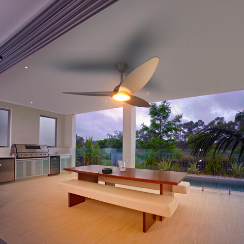 The Atomi Smart Outdoor Fan in an outdoor kitchen