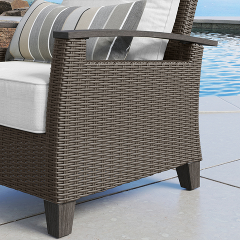 Wicker side panel of chair arm.