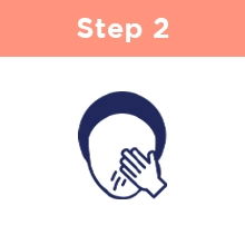 Step Two: A person wiping their face with their hand