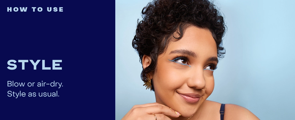 Image of a woman posing with short, healthy-looking hair.