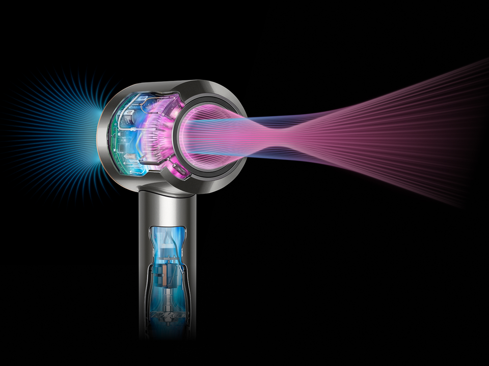 Graphics show the focused airflow through the Supersonic Travel hair dryer.