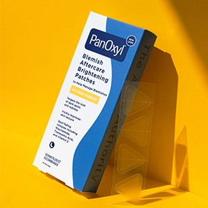 A box of Blemish Brightening Patches with an open strip of four patches next to it