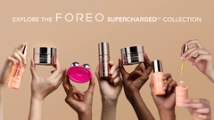 hands holding up supercharged collection skincare products