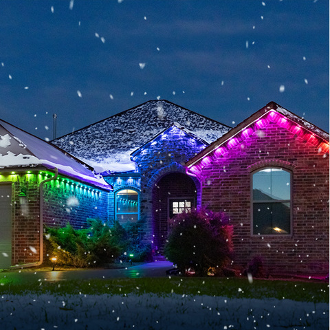 House with rainbow Eternity Lights in the snow