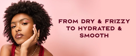 Image of a young woman with curly hair next to text: From dry &amp; frizzy to hydrated &amp; smooth.