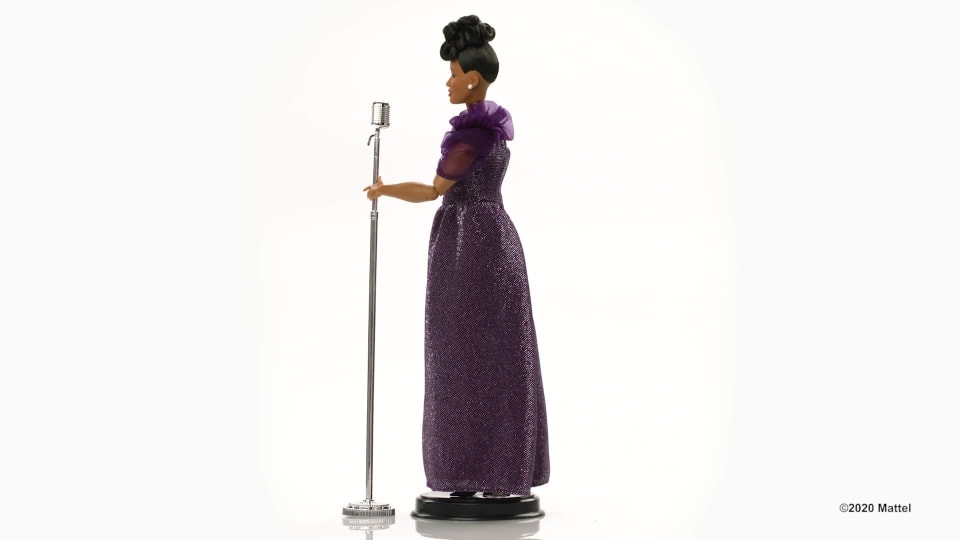thumbnail video image 2 of Barbie Inspiring Women Ella Fitzgerald Collectible Doll, Approx. 12-in, Wearing Purple Gown, with Microphone, 2 of 7