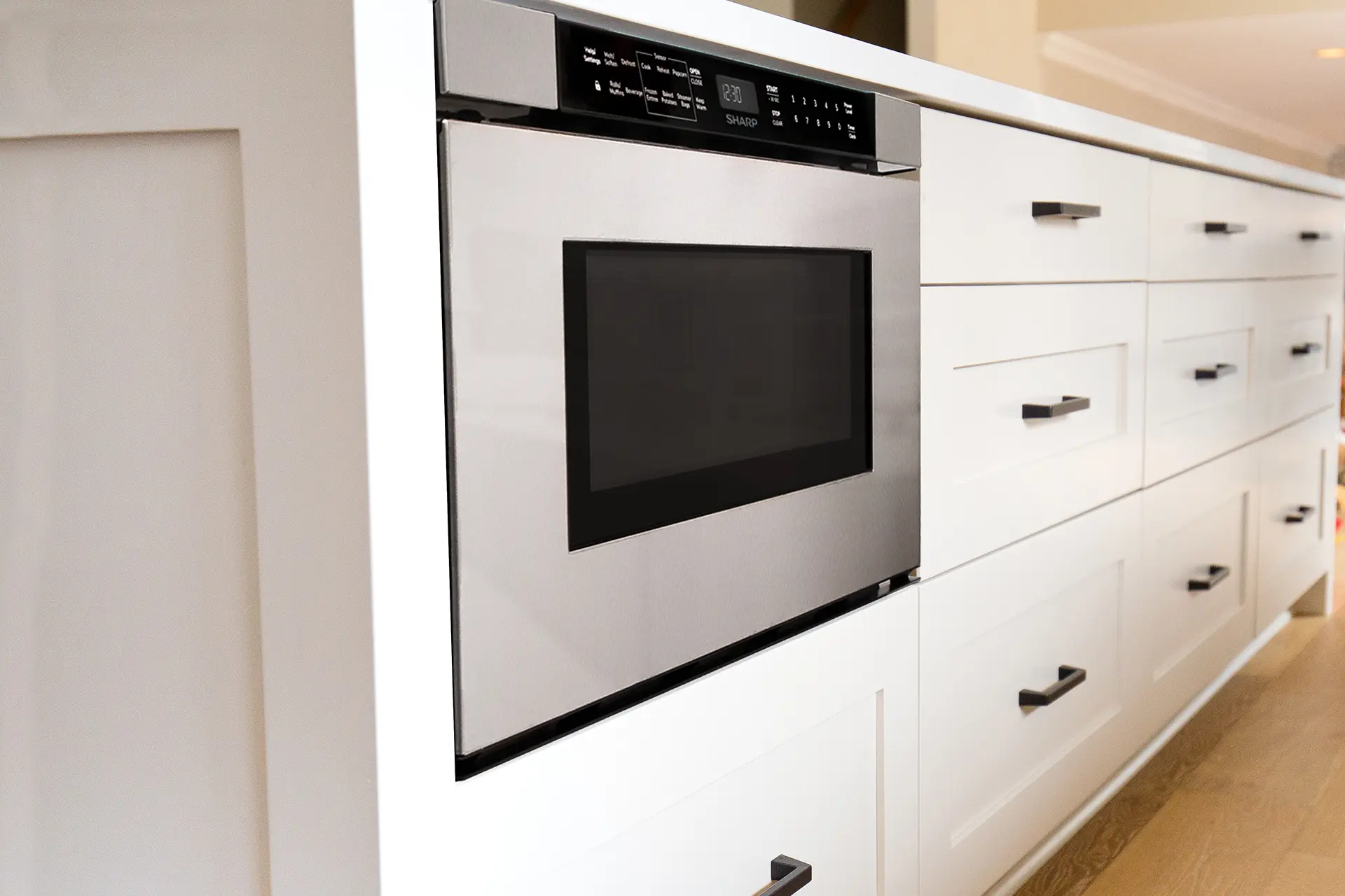Microwave Drawer Integration Modern kitchen featuring a built-in microwave drawer