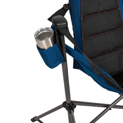 Cup holder on side of chair holding oversized travel mug.