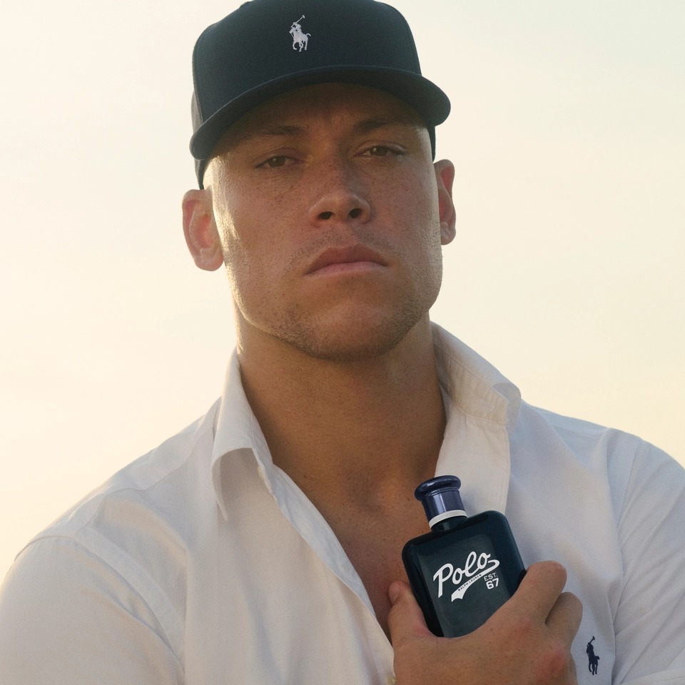 Aaron Judge holding the new Polo 67 Eau de Toilette