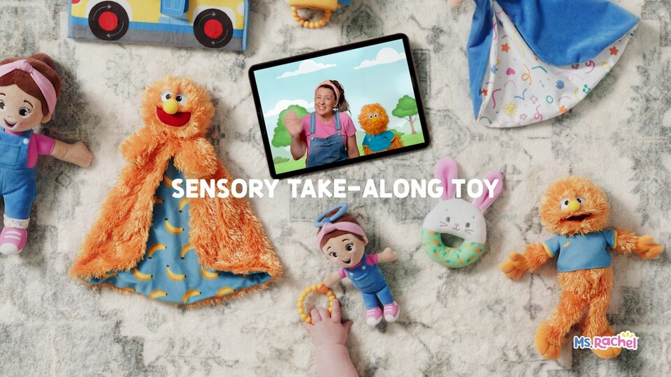 thumbnail video image 2 of Ms. Rachel Official Sensory Take-Along Plush Toy with Baby Rattle & Clip, 2 of 10