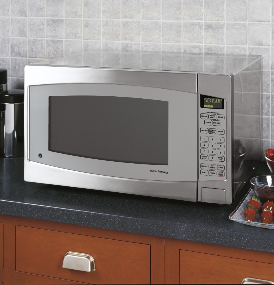 Ge 2.2 cu ft store microwave with trim kit