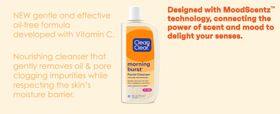 Bottle of Clean &amp; Clear Morning Burst Facial Cleanser on orange background