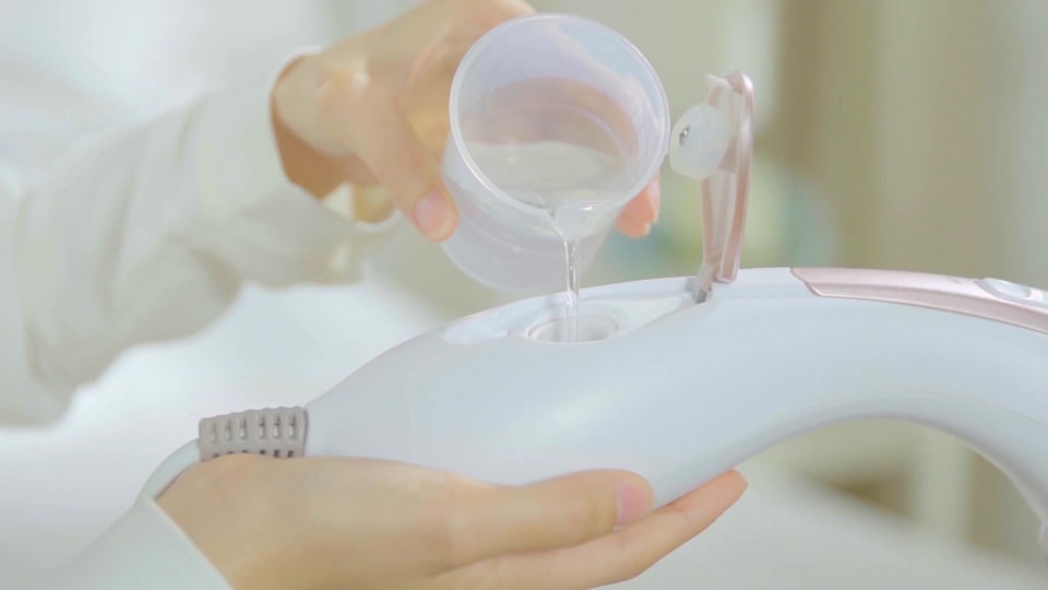 thumbnail video image 2 of SALAV® HS-100 Duopress Hand Held Garment Steamer and Iron with Ceramic-Coated Steam Plate and No-Drip System, 1150 watts, Silver, 2 of 18