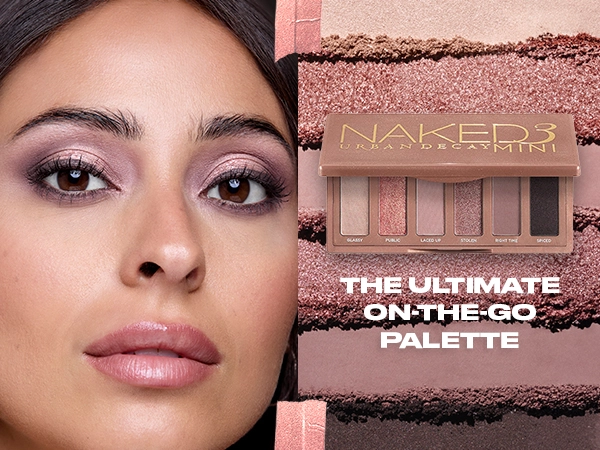 A model featuring the Urban Decay Naked  3 Mini Palette showcasing palette color range.