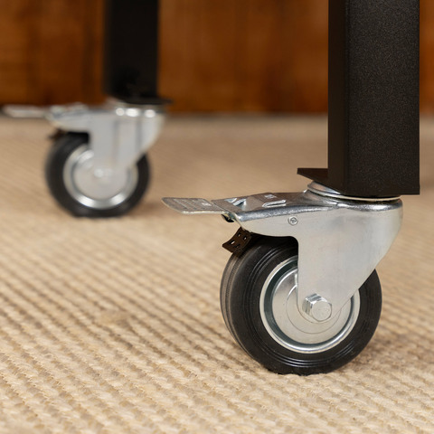 The griddle's two locking swivel casters shown in detail.