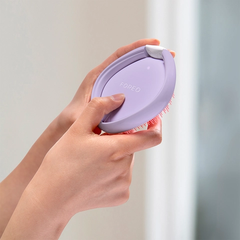 image of person turning on the device