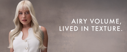 Blond woman with long hair and an airy, volume hairstyle next to text.