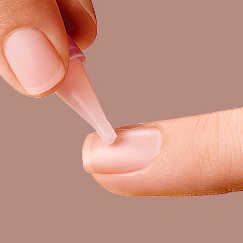 2. Apply glue to your natural nail.