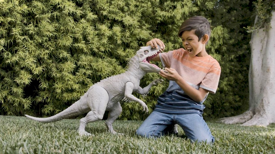 thumbnail video image 2 of Jurassic World Camp Cretaceous Super Colossal Indominus Rex Action Figure with Eating Feature, Stands 18in High and 3.5ft Long, Dinsoaur Toy Gift ​, 2 of 7