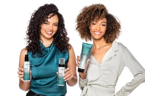 Curls Like Us brand models holding collection