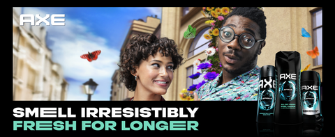 Image of a goofy-looking man &amp; a pretty woman staring at him, next to AXE products lineup &amp; text.