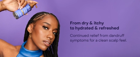 SheaMoisture spray held by woman with braided hair. Text reads: "From dry &amp; itchy to hydrated &amp; refreshed. Continued relief from dandruff symptoms for a clean scalp feel."