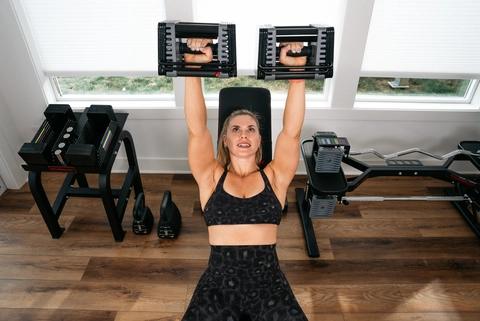 Elite EXP being used in a shoulder press