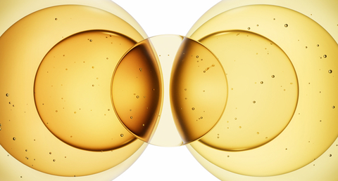 The Dyson Oli7 blend represented as abstract circles of oils.