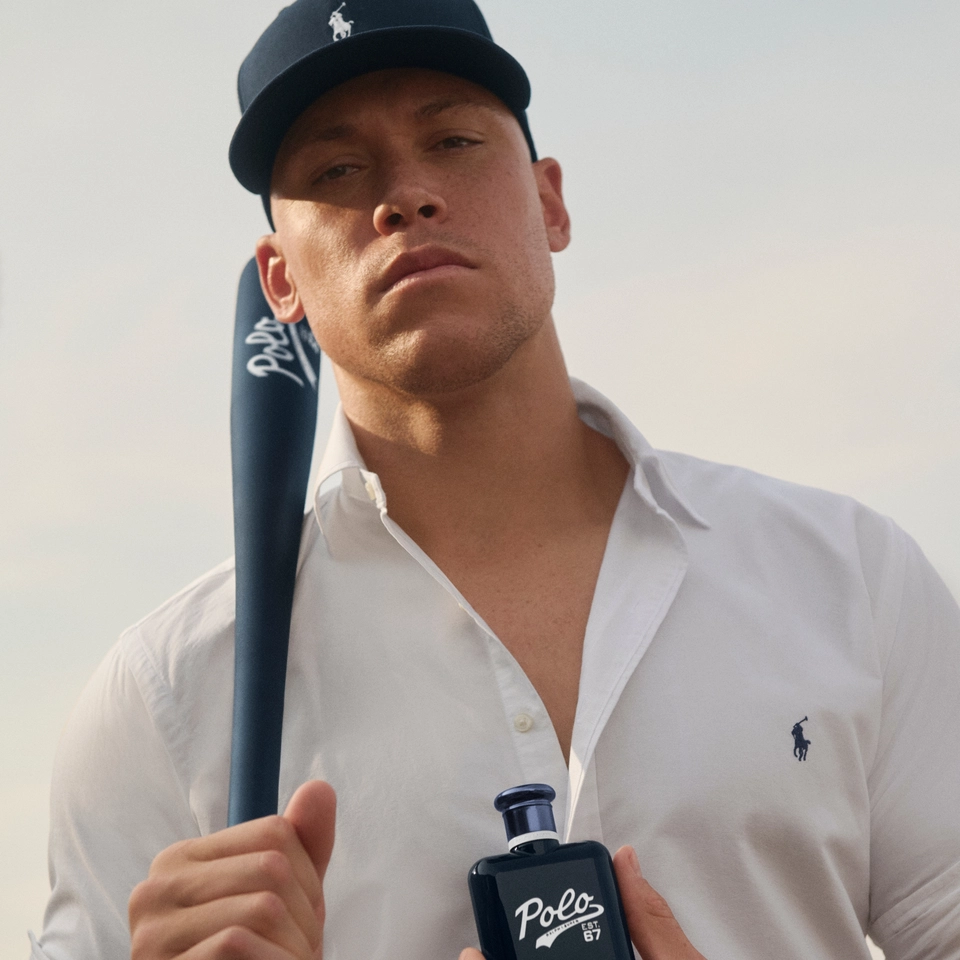 Aaron Judge holding the new Polo 67 Eau de Toilette