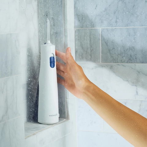 Using the Cordless 1000 Water Flosser WF-29 White in the Shower