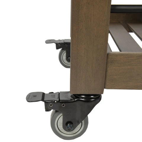 Locking caster wheel on one foot of the wood cooler.