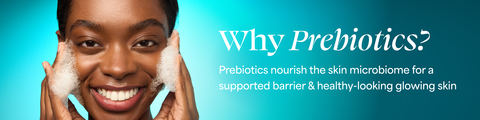 Model lathering foam onto cheeks on blue background, explanation of prebiotics in text
